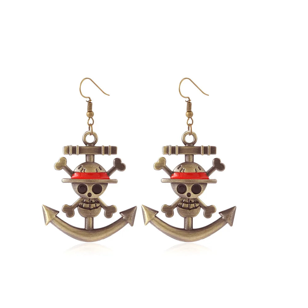 Pendientes de One Piece: ancla marina y león soleado