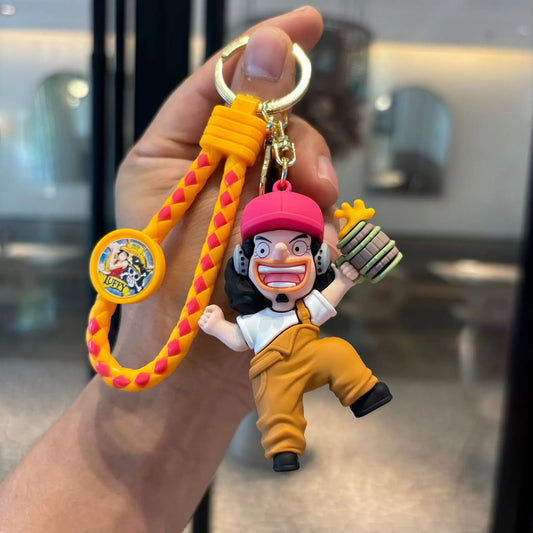 Portachiavi con statuetta di One Piece – Costume d'azione di Usopp giallo