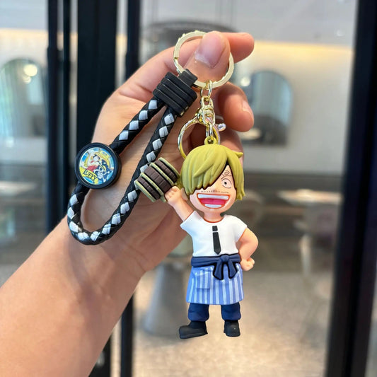 Portachiavi con statuetta di One Piece – Sanji in abito blu, sorridente