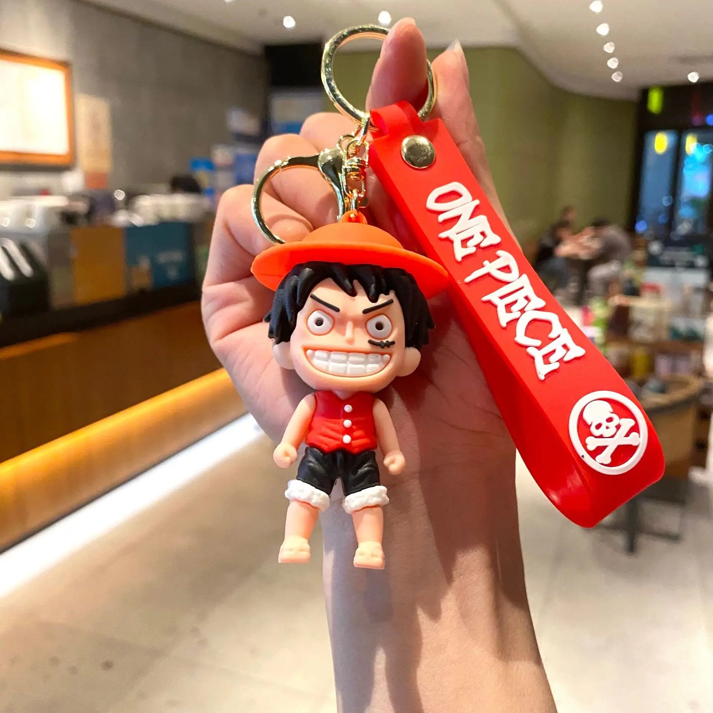 Llavero de dibujos animados de One Piece: Luffy con fondo rojo