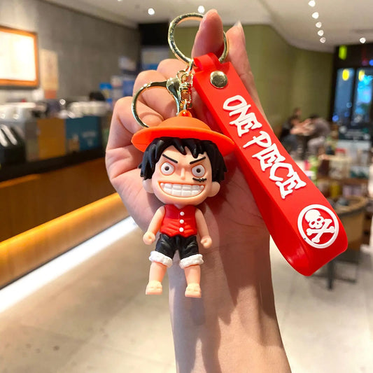 Portachiavi dei cartoni animati di One Piece – Rufy sfondo rosso