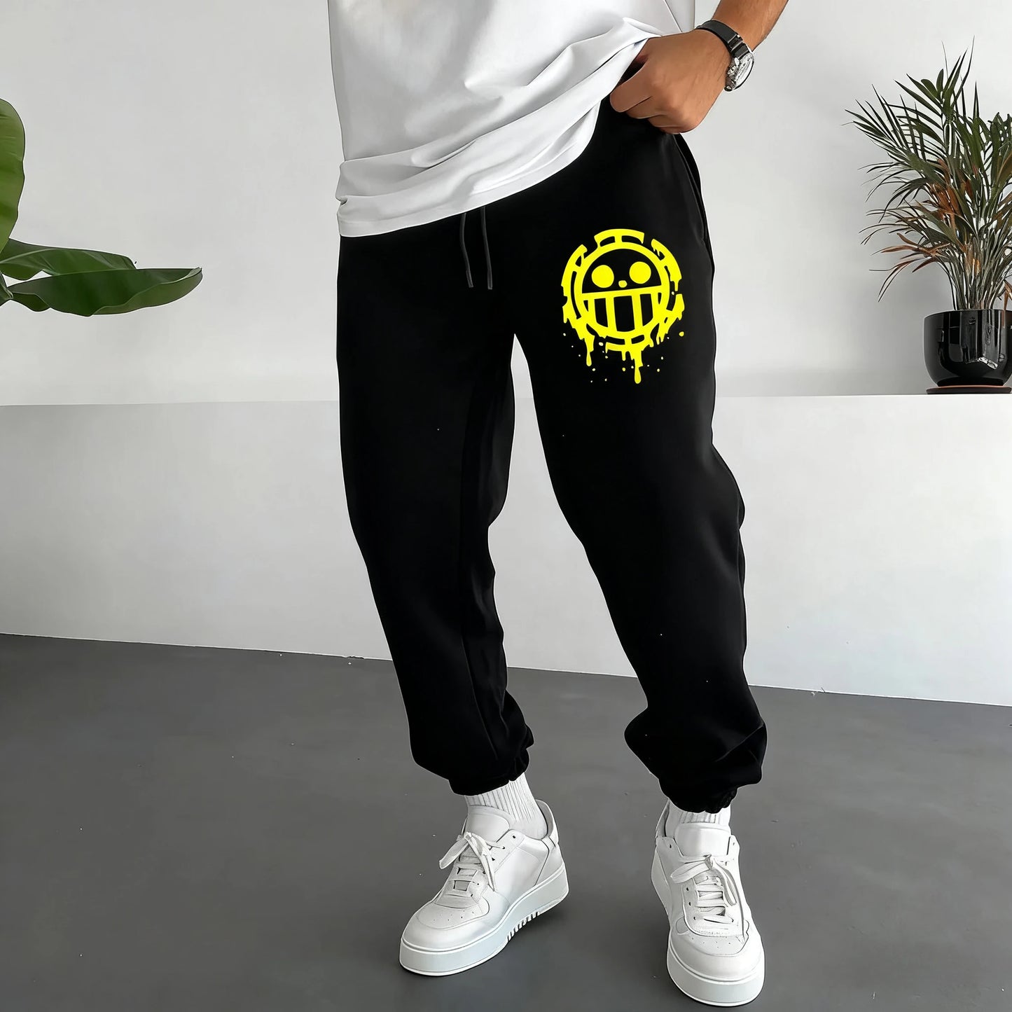 Jogging One Piece - Logo Trafalgar Law dei pirati del cuore (giallo e nero)